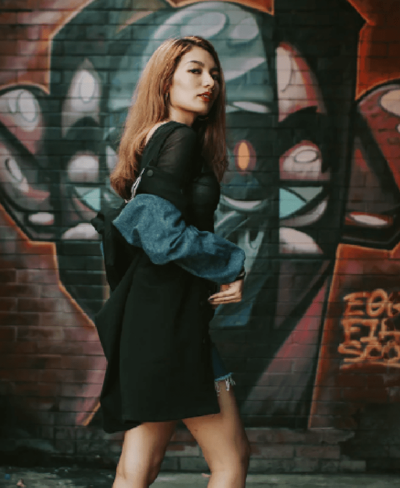 Woman at mural.