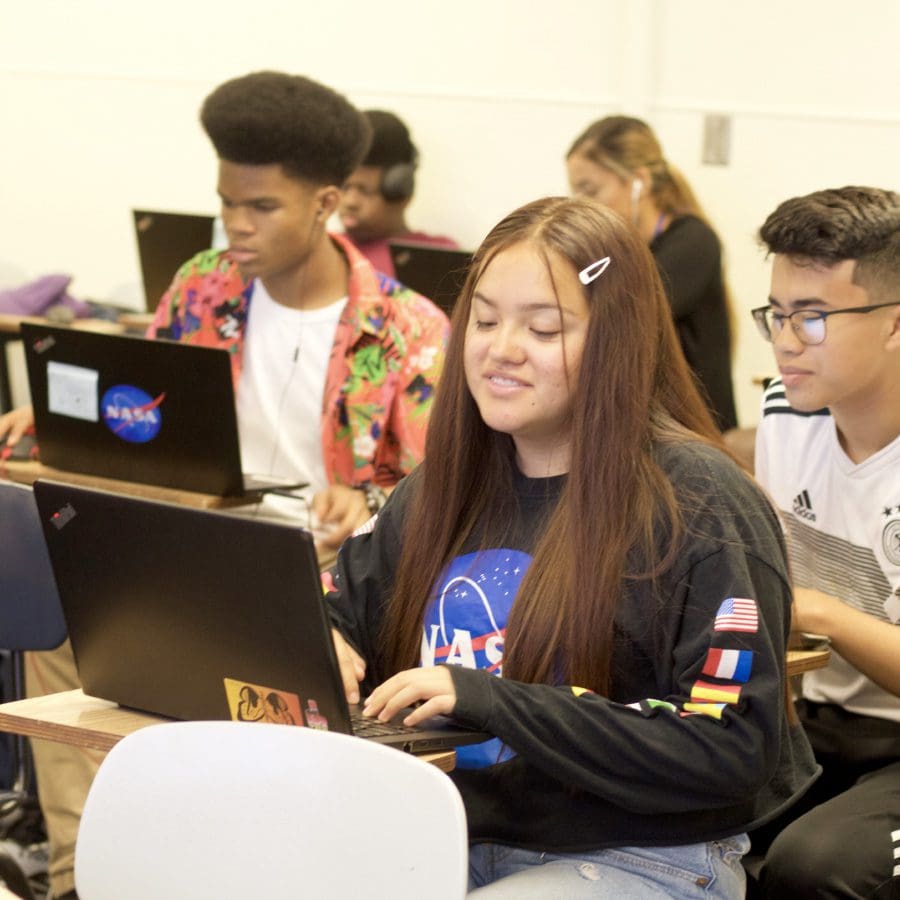Teens in classroom, representing SMASH Illinois.