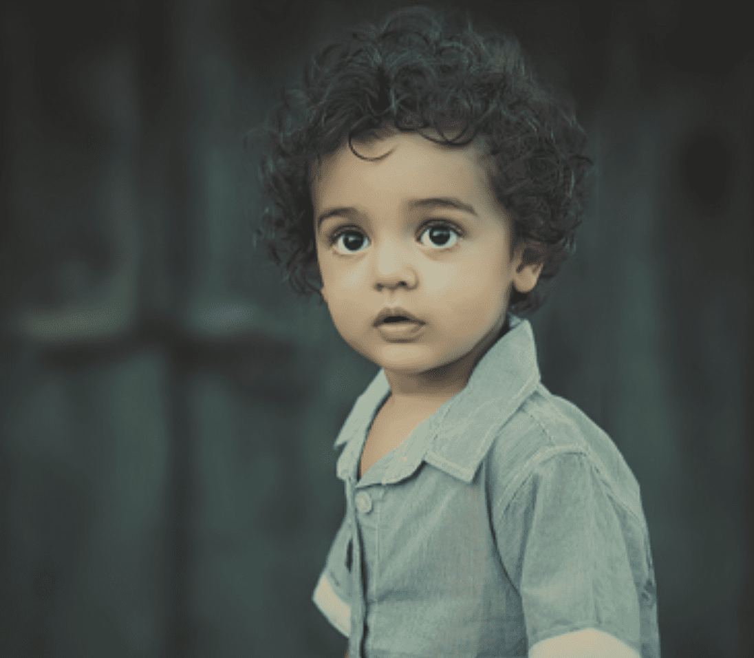 Child gazes upward.