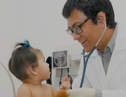 Doctor and child, representing Medical Home Network.