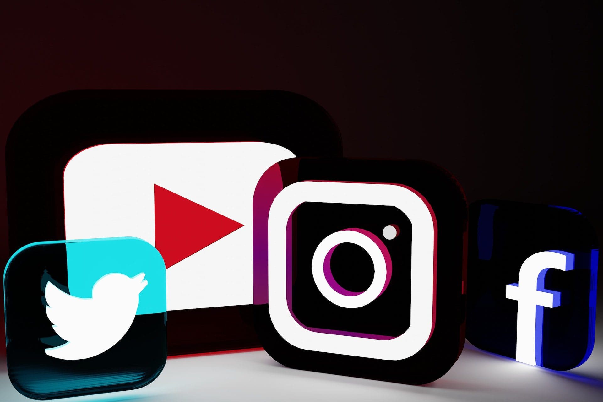 Twitter, YouTube, Instagram and Facebook logos.