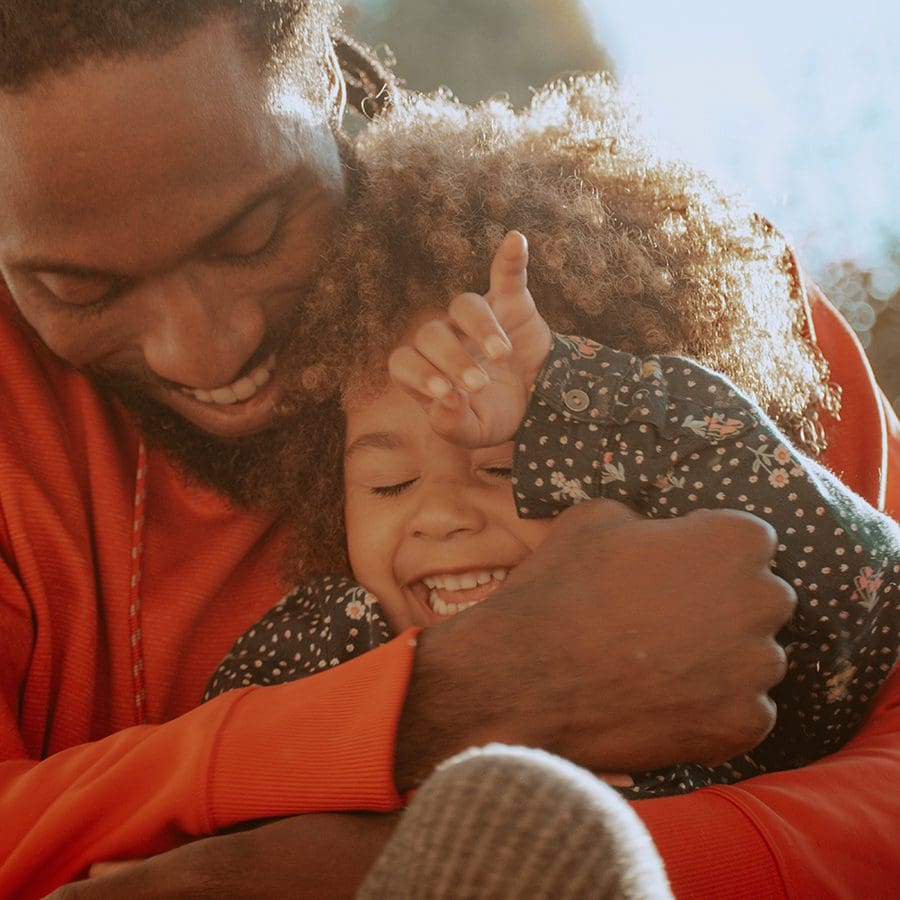 Parent and child representing Friend Health.