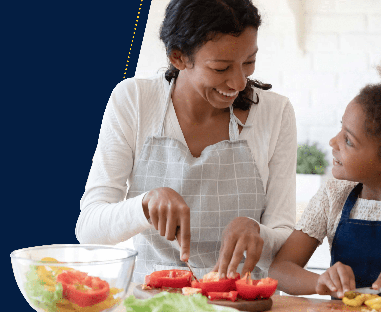 Mother and child prepare food.