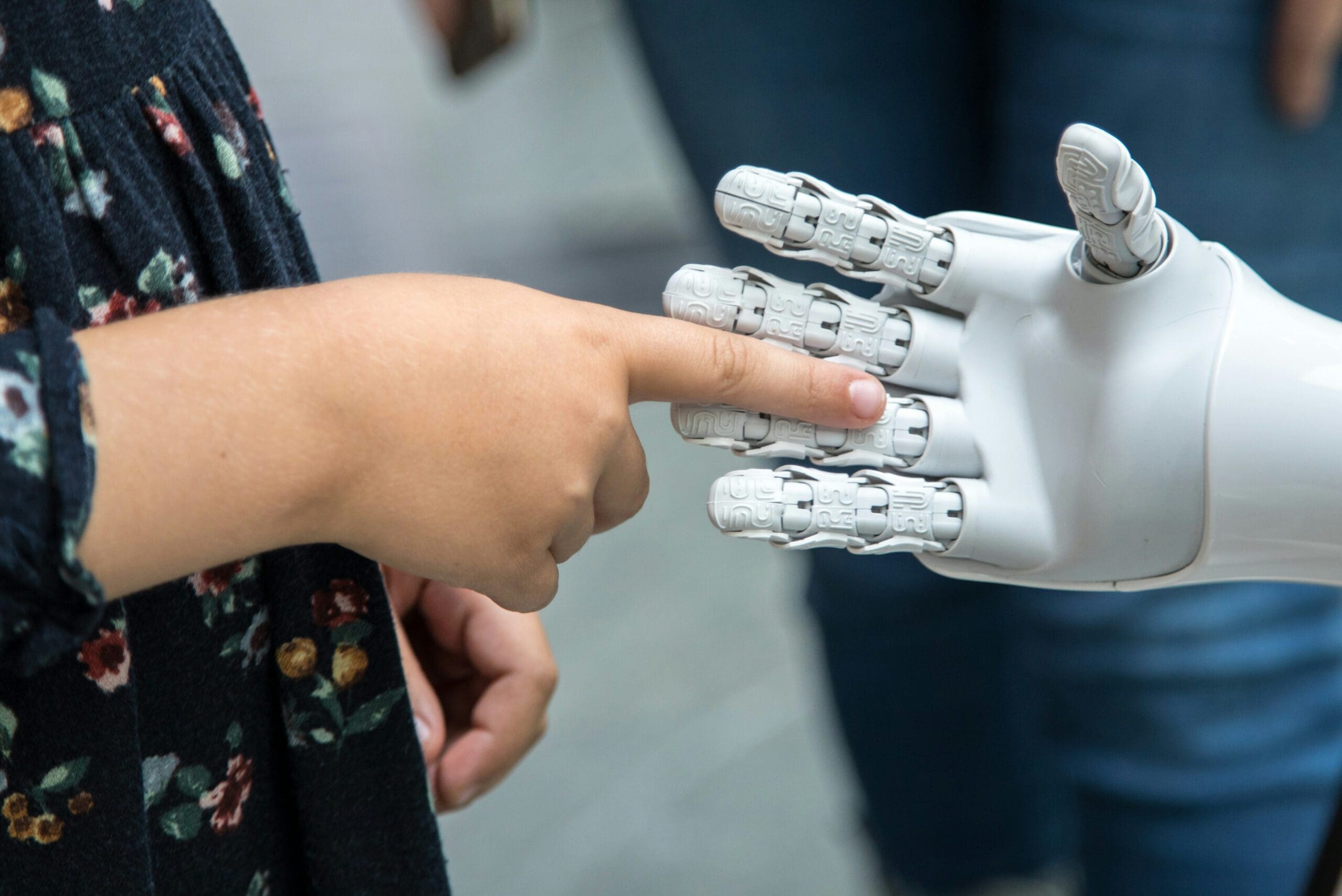 Human and robot hands.